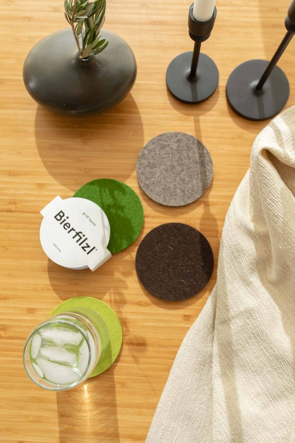 Earthy greens and browns set of Graf Lantz round wool coasters