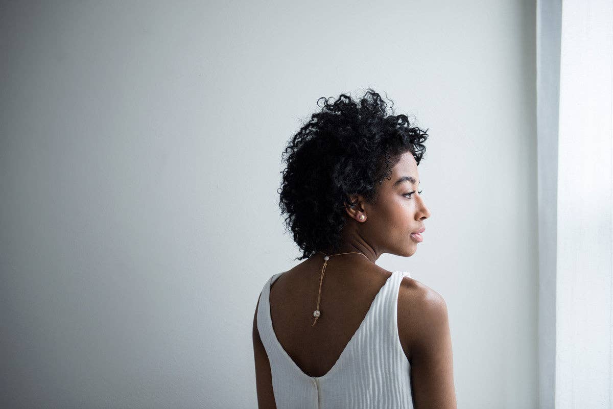 Curve Necklace: White Porcelain/Leather Cord
