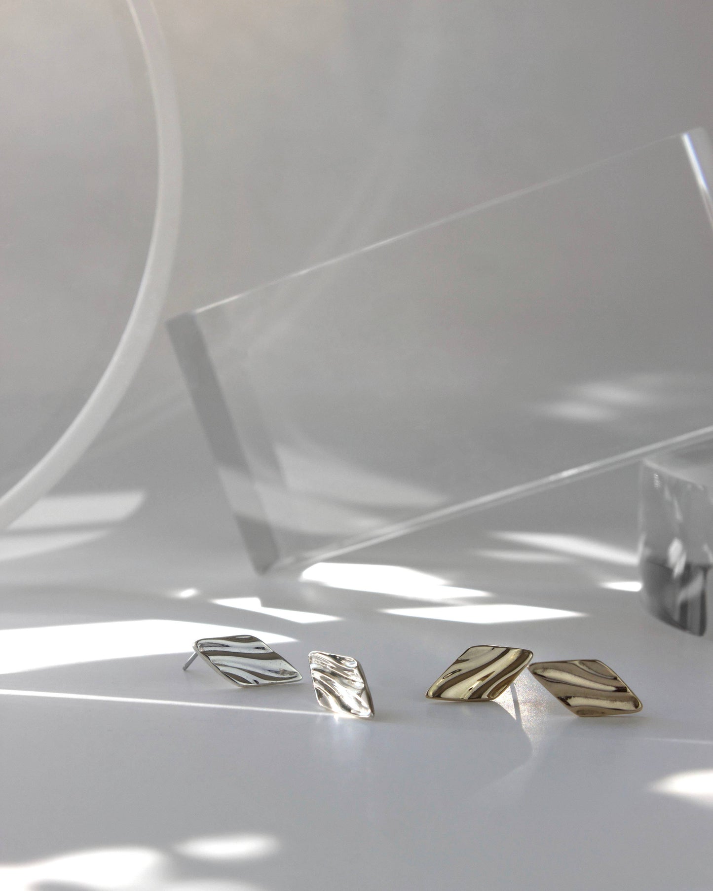 Sway Stud Earrings: Sterling silver