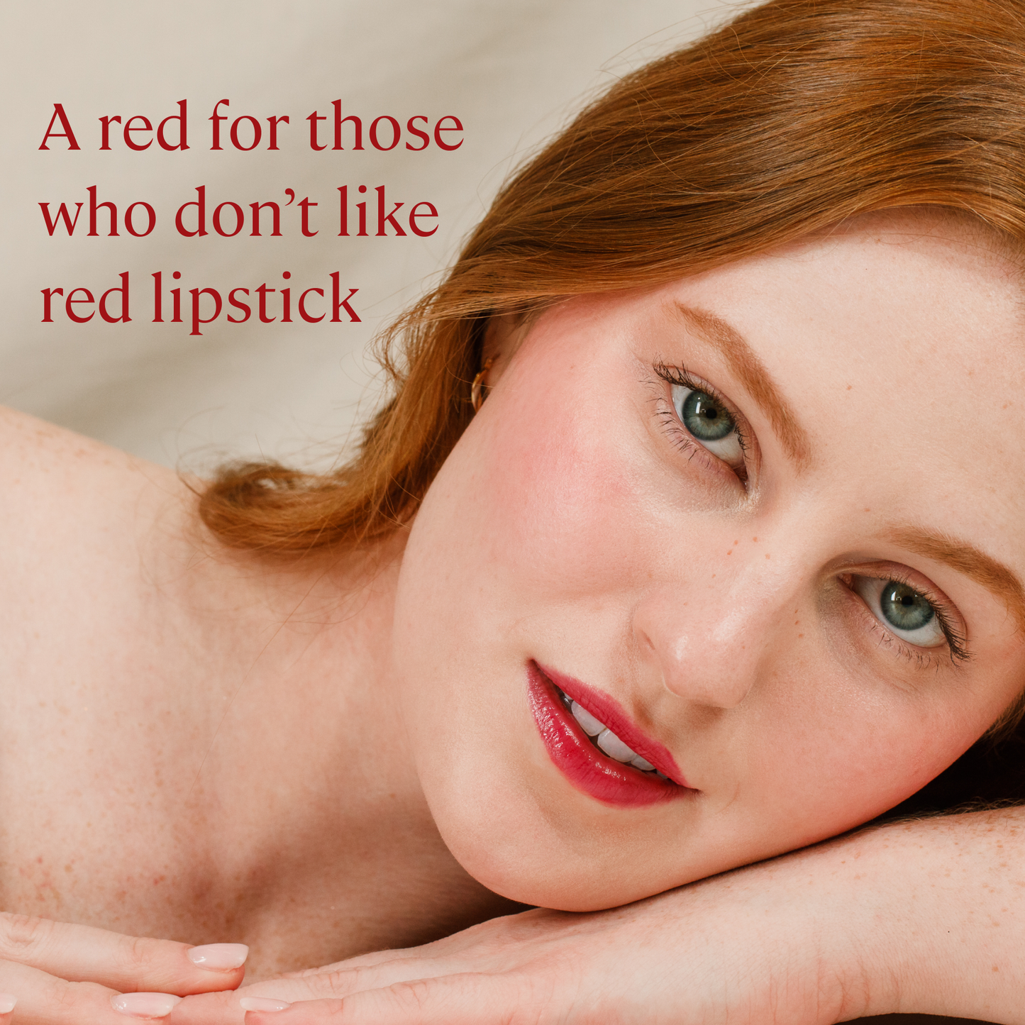 Poppy Red Hydrating Lip Gloss by Minori Beauty on fair skinned model
