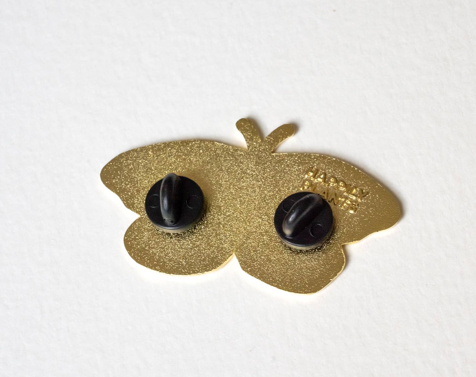 back of gold enamel butterfly pin