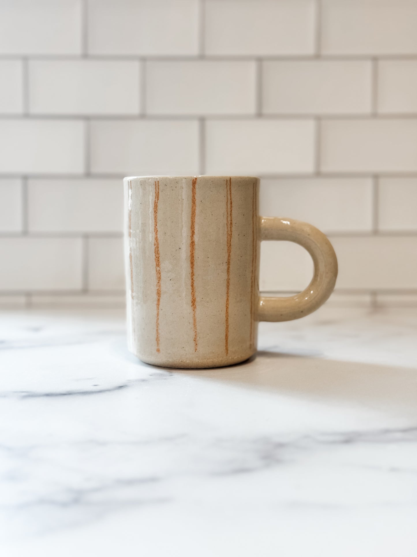Cream and rust striped handmade ceramic rug - made in Portland - shop gifts on Poppy & Hawk