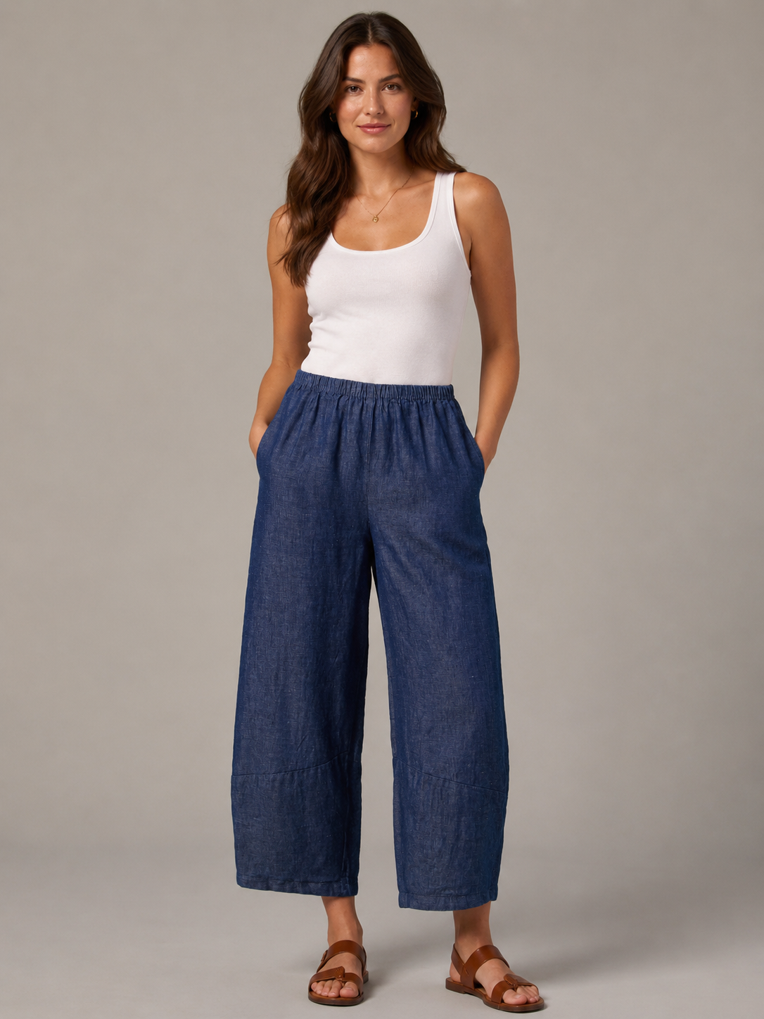 Woman wearing relaxed linen barrel pant for sale at Poppy & Hawk