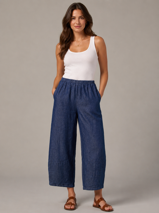 Woman wearing relaxed linen barrel pant for sale at Poppy & Hawk